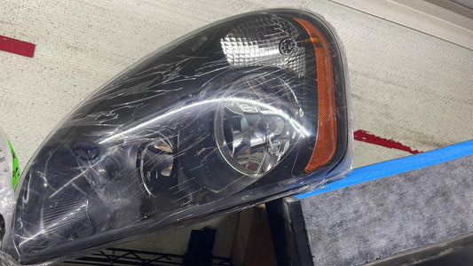 HEADLIGHT ASSEMBLY LH IN BLACK 08-17 CASCADIA HALOGEN